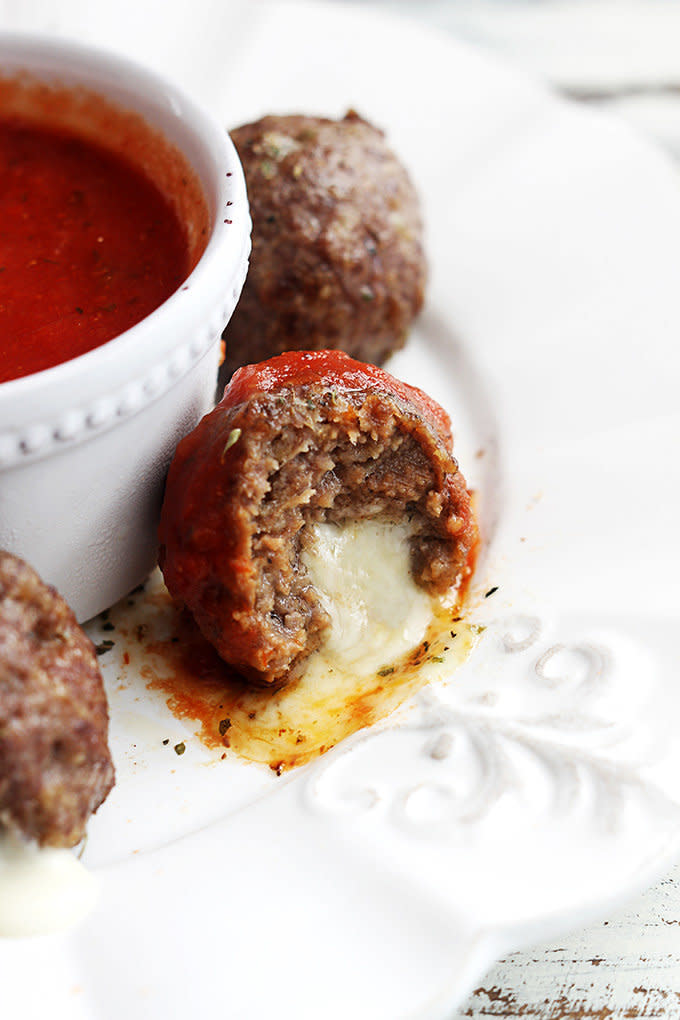 <strong>Get the <a href="http://www.lecremedelacrumb.com/slow-cooker-mozzarella-stuffed-meatballs/" target="_blank">Slow Cooker Mozzarella-Stuffed Meatballs recipe</a>&nbsp;from Cream de la Crumb</strong>