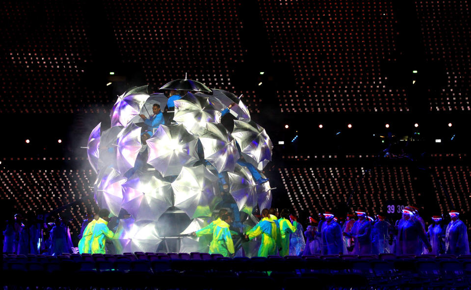 LONDON, ENGLAND - AUGUST 29: Artists perform with umbrellas during the Opening Ceremony of the London 2012 Paralympics at the Olympic Stadium on August 29, 2012 in London, England. (Photo by Dan Kitwood/Getty Images)