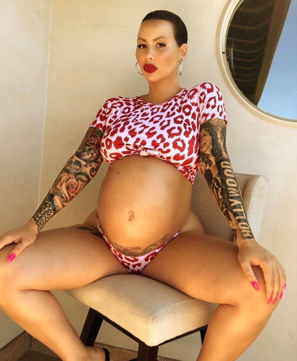 Amber Rose poses in a bikini while pregnant