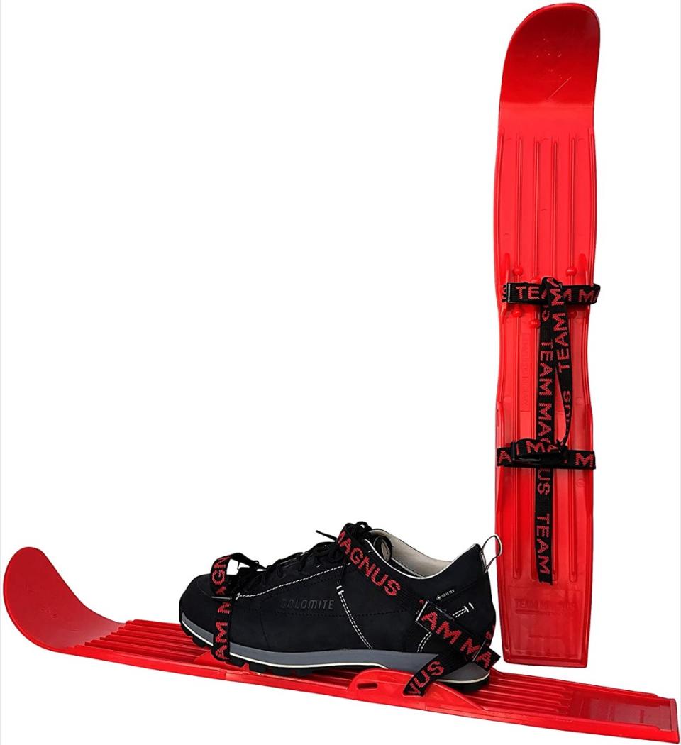 Red strap-on mini skis