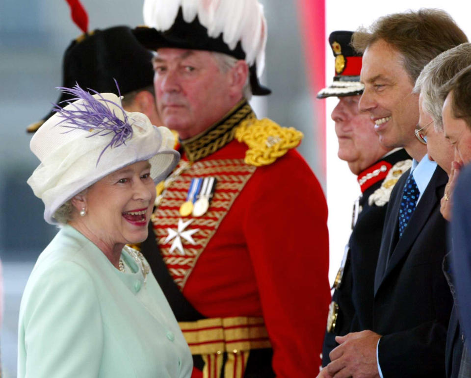 Queen Elizabeth II laughs with Prime Minister Tony Blair (3rd right) as she and Russian President Vladimir Putin (not pictured) arrive at Horse Guards Parade, London, on the first day of his state visit.   *  It is the first state visit by a Russian leader since the days of the Tsars.  