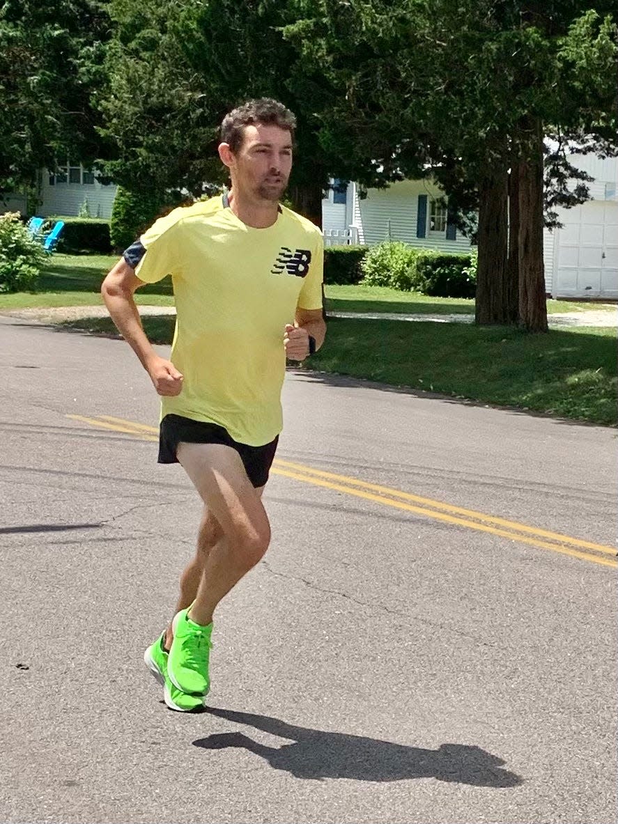 Andrew McCann trains before the Boston Marathon on Maplewood Avenue in Westerly.
