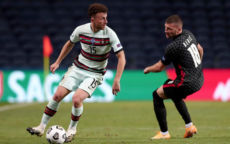 Portugal's Diogo Jota controls the ball next to Croatia's Ante Rebic, right, during the UEFA Nations League soccer match between Portugal and Croatia at the Dragao stadium in Porto, Portugal, Saturday, Sept. 5 - Liverpool transfer business not over yet as they show interest in Wolves striker Diogo Jota - AP