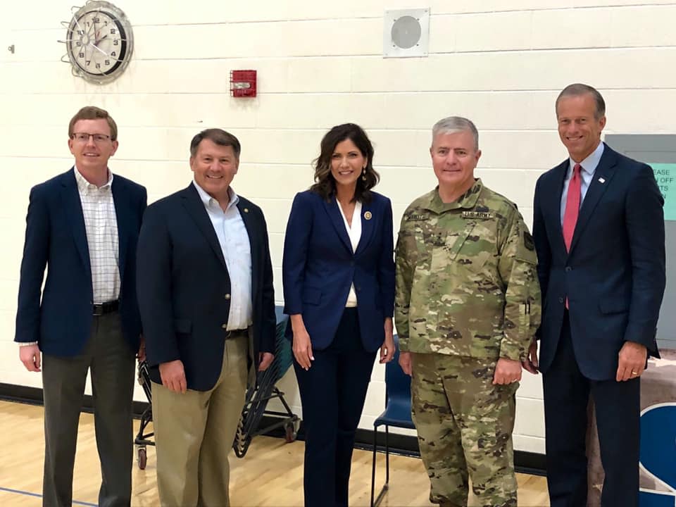 Dusty Johnson with Sen. Mike Rounds (second from left) and Sen. John Thune (far right), along with Gov. Kristi Noem at a South Dakota event. The congressional delegation has had a sometimes strained relationship with Noem.