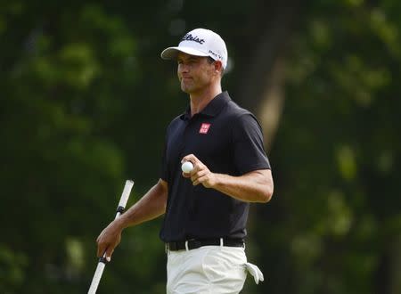 Aug 12, 2018; Saint Louis, MO, USA; Adam Scott after putting on the 10th green during the final round of the PGA Championship golf tournament at Bellerive Country Club. Mandatory Credit: Jeff Curry-USA TODAY Sports