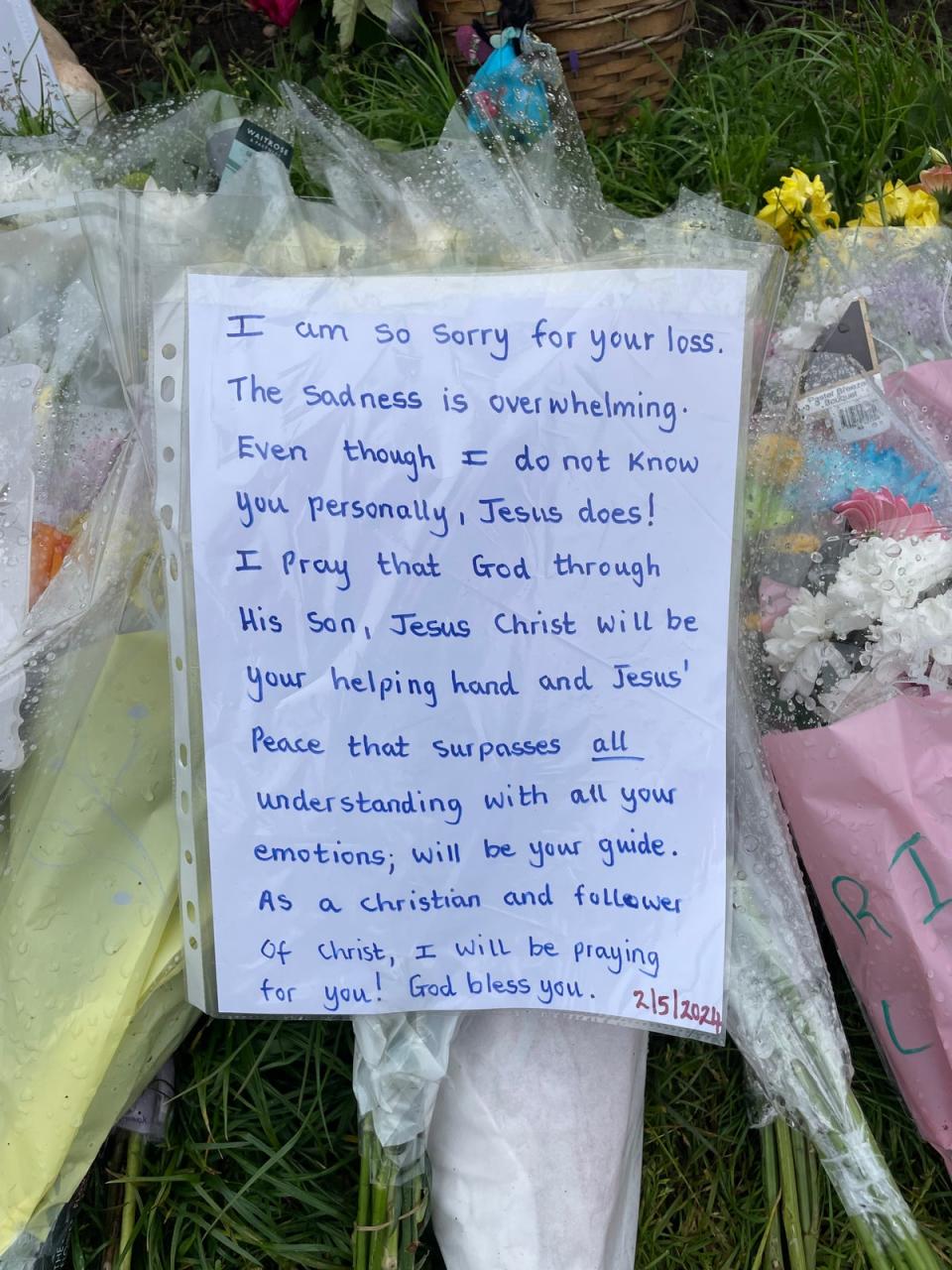 A message on flowers at the scene at the scene in Hainault (Samuel Montgomery/PA Wire)