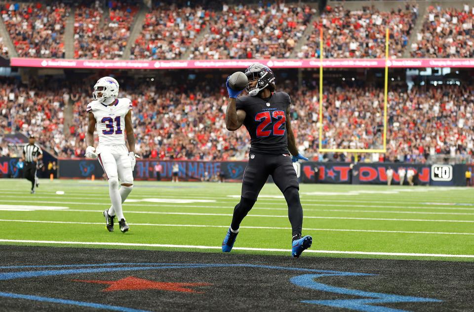 HOUSTON, TEXAS - OCTOBER 06: Cam Akers #22 of the Houston Texans scores a touchdown during the first quarter against the Buffalo Bills at NRG Stadium on October 06, 2024 in Houston, Texas. (Photo by Tim Warner/Getty Images)