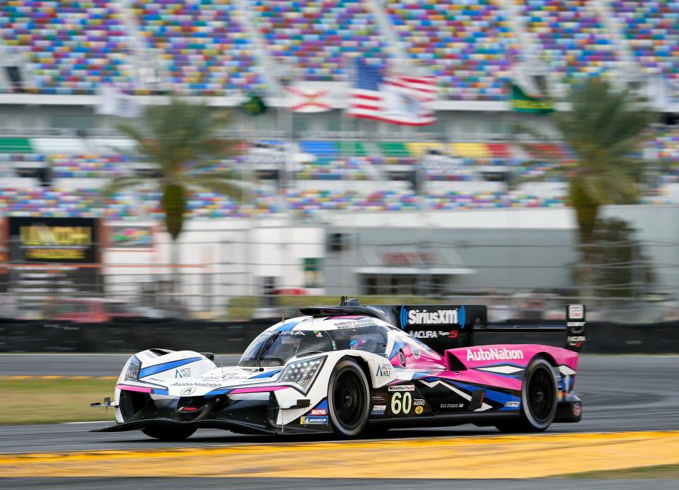 The N0. 60 Myer Shank Racing Acura ARX-06 speeds away at qualifying Sunday for the 61st running of the Rolex 24 at Daytona. Area hoteliers say they anticipate booming business for this weekend's race. 
(Photo: Nigel Cook/News-Journal)