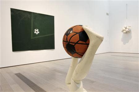 "Free Throw" by Mary Ellen Caroll is seen at the exhibition under construction, "Futbol: The Beautiful Game", at the Los Angeles County Museum of Art (LACMA) in Los Angeles, California, January 27, 2014. REUTERS/David McNew