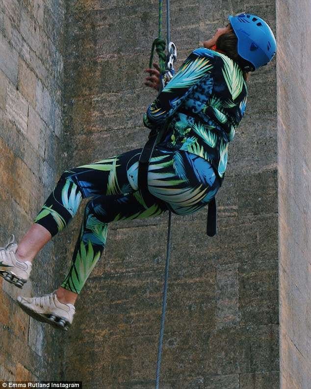 Emma Manners, the Duchess of Rutland, prepares to rappel down the turret of the Manners family's ancestral home, Belvoir. 

Instagram photo