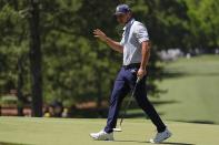 Bryson DeChambeau waves after making a putt on the seventh hole during second round at the Masters golf tournament at Augusta National Golf Club Friday, April 12, 2024, in Augusta, Ga. (AP Photo/Ashley Landis)