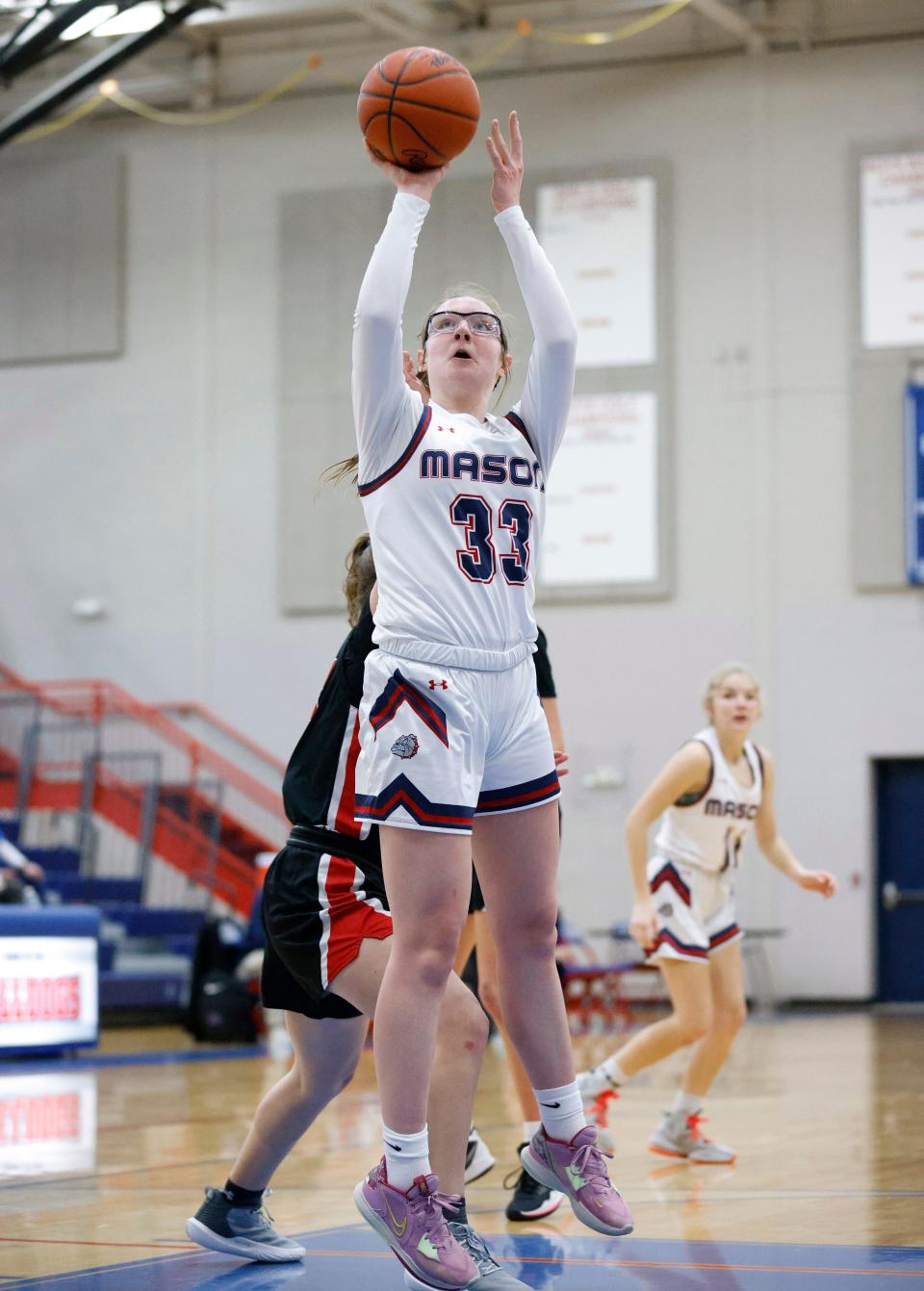 Mason's Ashlynn Putman shoots against St. Johns, Friday, Jan. 6, 2023, in Mason.