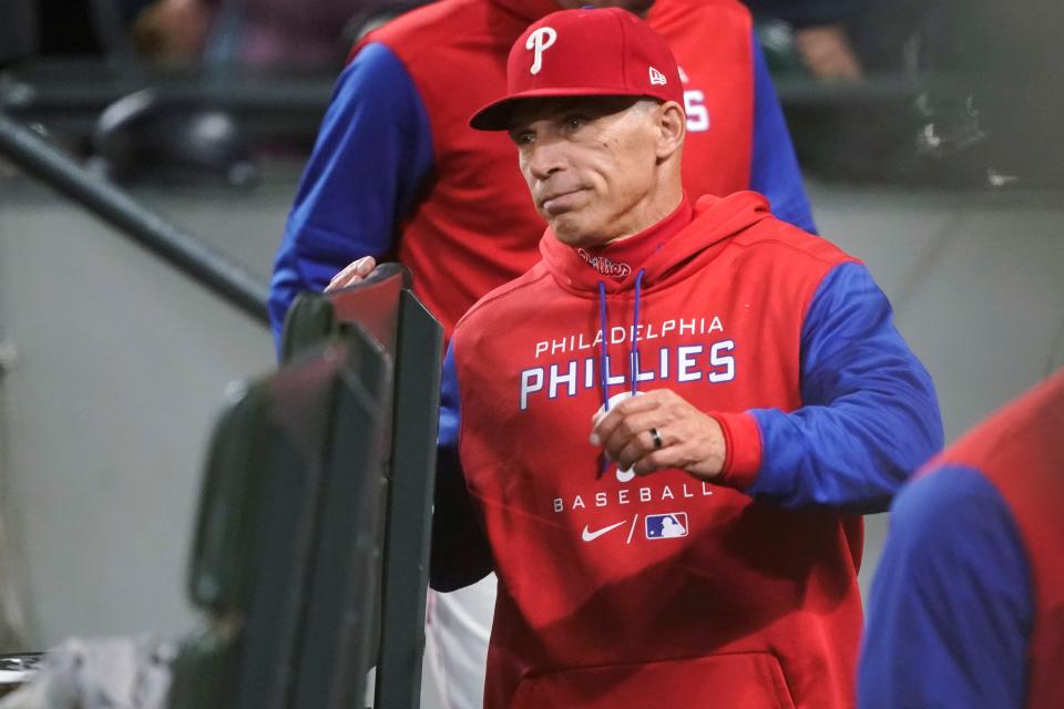 Phillies manager Joe Girardi walks to the dugout following a game against the Mariners.