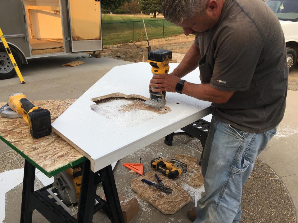 B.J. Uptgraft constructed the mobile kitchen trailer, Kickin Kurbz, which he helps operate with his wife and two children.