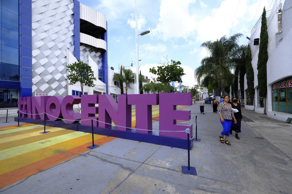 A sculpture hashtag that spells out the English word for innocent in reference to church leader Naason Joaquin Garcia, stands in a pedestrian walkway that leads to the La Luz del Mundo or Spanish for The Light of the World flagship temple, in Guadalajara, Mexico, Saturday, Aug. 13, 2022. Garcia, 53, was arrested in 2019 in California. He initially faced more than 20 charges, but most were dismissed after a plea deal with prosecutors. He is currently serving a 16-year sentence in a Los Angeles prison after pleading guilty to sexually abusing minors. (AP Photo/Refugio Ruiz)