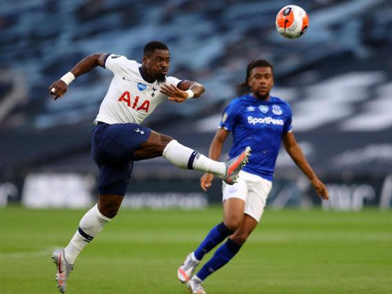 Aurier thumps the ball clear with Iwobi closing in (Getty)