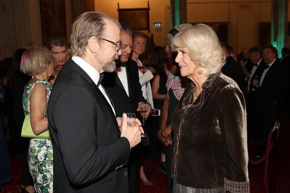 The Duchess of Cornwall speaks to George Saunders during a reception at the Guildhall ahead of the Man Booker award ceremony (PA)