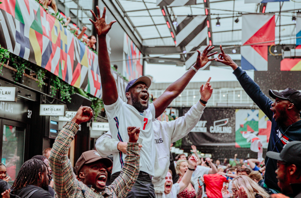 Rapper Stormzy celebrates England's victory over Germany in Euro 2020 round at BOXPARK Croydon in south London. (PA)