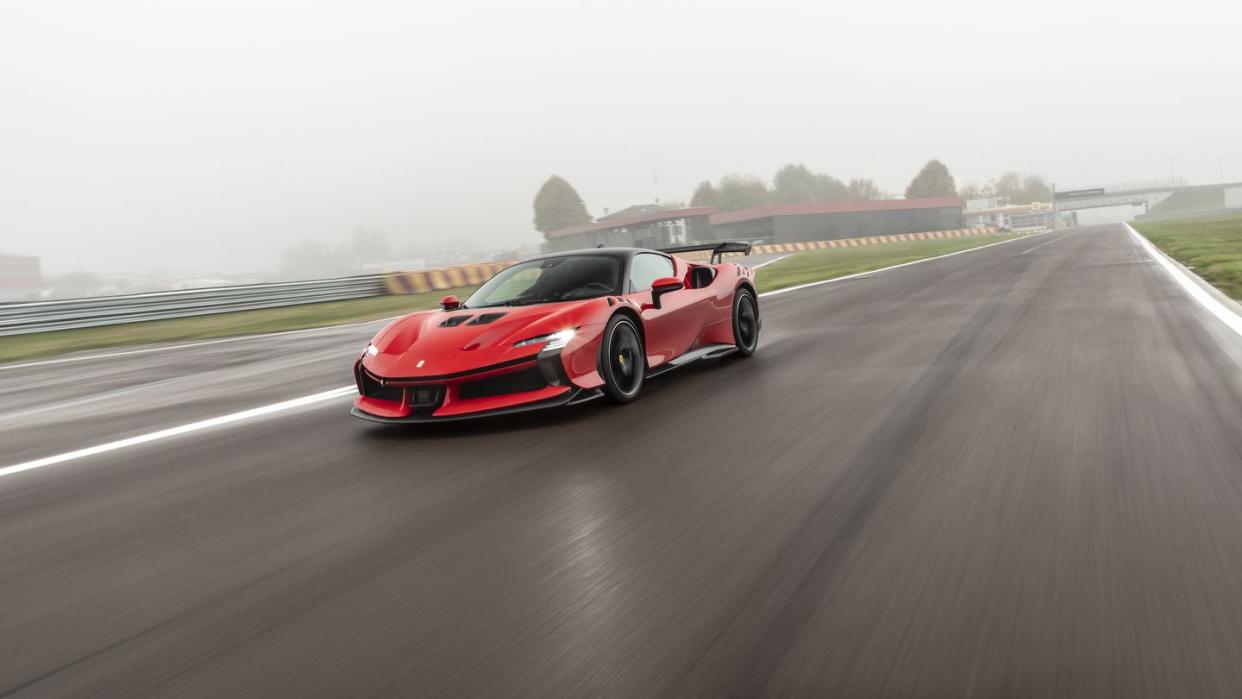 a red sports car on a road