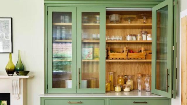 When It Comes to Upper-Corner Kitchen Cabinet Organization, a Pro Swears by  This Tool