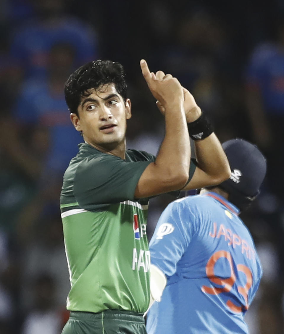 Naseem Shah of Pakistan celebrates the wicket of India's Jasprit Bumrah during the Asia Cup cricket match between India and Pakistan at Pallekele, Sri Lanka, Saturday, Sept. 2, 2023. (AP Photo/Pankaj Nangia)