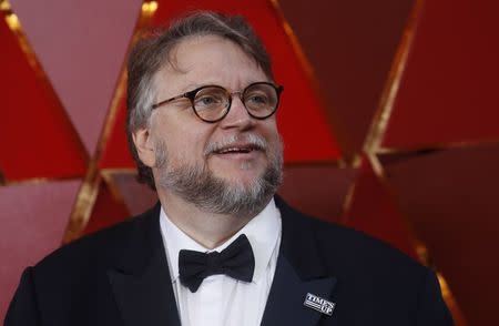 90th Academy Awards - Oscars Arrivals - Hollywood, California, U.S., 04/03/2018 - Best Director Nominee Guillermo del Toro wears a Times Up pin. REUTERS/Carlo Allegri