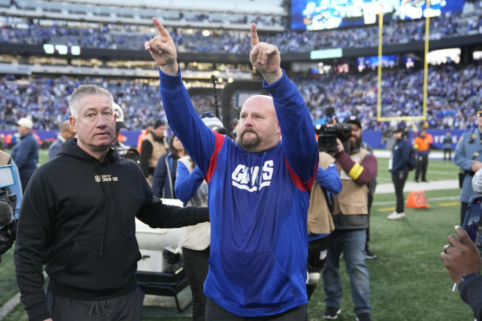 New York Giants head coach Brian Daboll gestures to fans after an NFL football game against the Indianapolis Colts, Sunday, Jan. 1, 2023, in East Rutherford, N.J. The Giants won 38-10. (AP Photo/Seth Wenig)