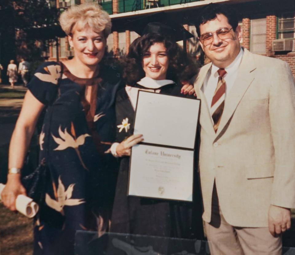 Lisa Tawil with her parents, Judy and Albert Tawil, at her college graduation in New Orleans in 1985.