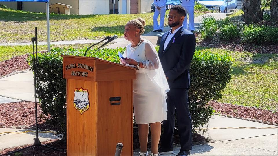 Ernestine Foster, joined by son Vernon Foster, speaks during the USS Stark memorial. Her husband, Quartermaster Vernon Foster Sr., was one of 37 sailors killed in the 1987 Iraqi missile attack on the Mayport-based ship.