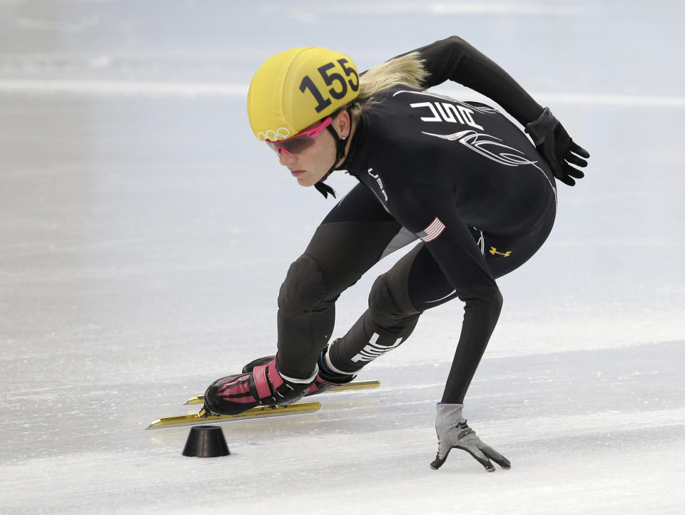 Emily Scott of the United States practices during a short track speedskating practice session at the Iceberg Skating Palace during the 2014 Winter Olympics, Friday, Feb. 14, 2014, in Sochi, Russia. (AP Photo/Darron Cummings)