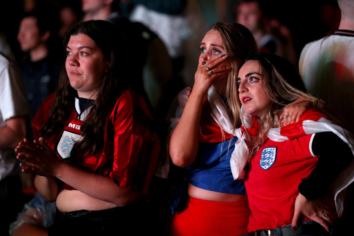 England fans are dejected after England lose the game on penalties at Vinegar Yard, London as they watch the UEFA Euro 2020 Final between Italy and England. Picture date: Sunday July 11, 2021.