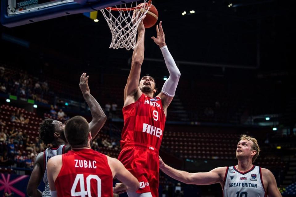 Dario Saric look to finish at the rim against Great Britain in EuroBasket play Saturday in Milan Italy.