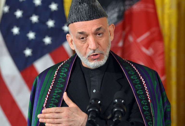 Afghan President Hamid Karzai answers a question during a press conference at the White House on January 11, 2013. US President Barack Obama has said the US goal in Afghanistan is "within reach" as he vowed to move ahead with a timetable to end the 11-year-old military campaign and focus on a broad domestic agenda