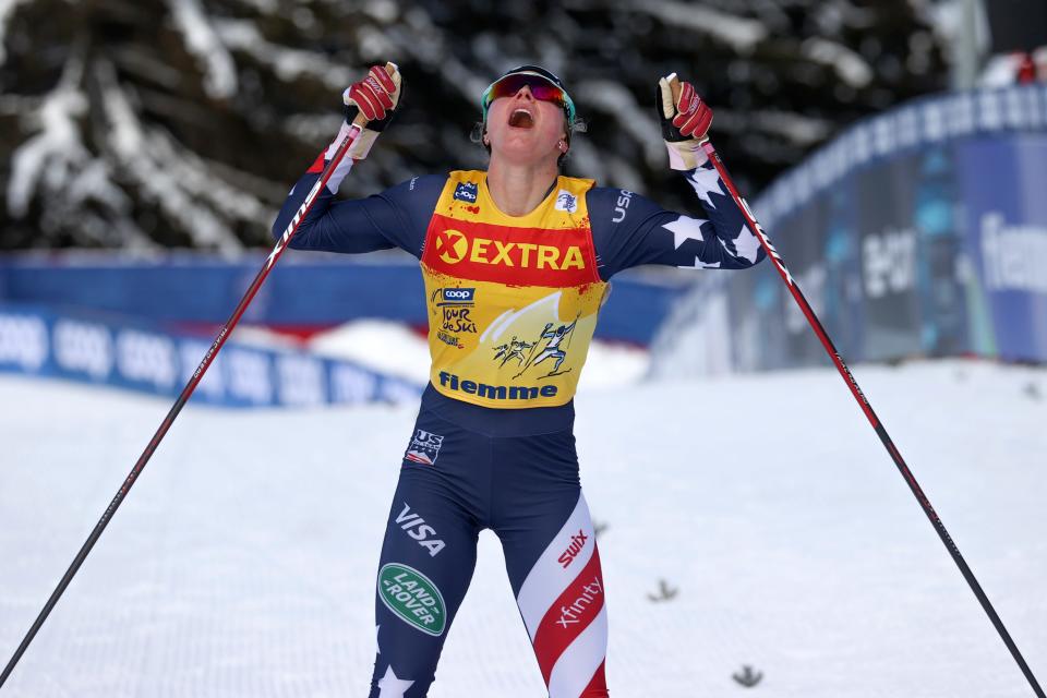 United States' Jessie Diggins celebrates after completing a women's Tour de Ski, cross-country 10K mass start event, in Val di Fiemme, Italy, Jan. 10, 2021. Diggins finished in second placed and clinched the Tour de Ski trophy. (AP Photo/Alessandro Trovati)
