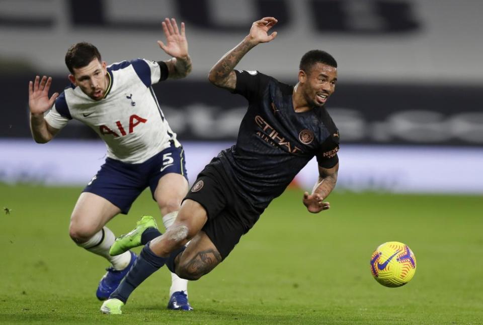 Pierre-Emile Højbjerg tussles with Manchester City’s Gabriel Jesus.