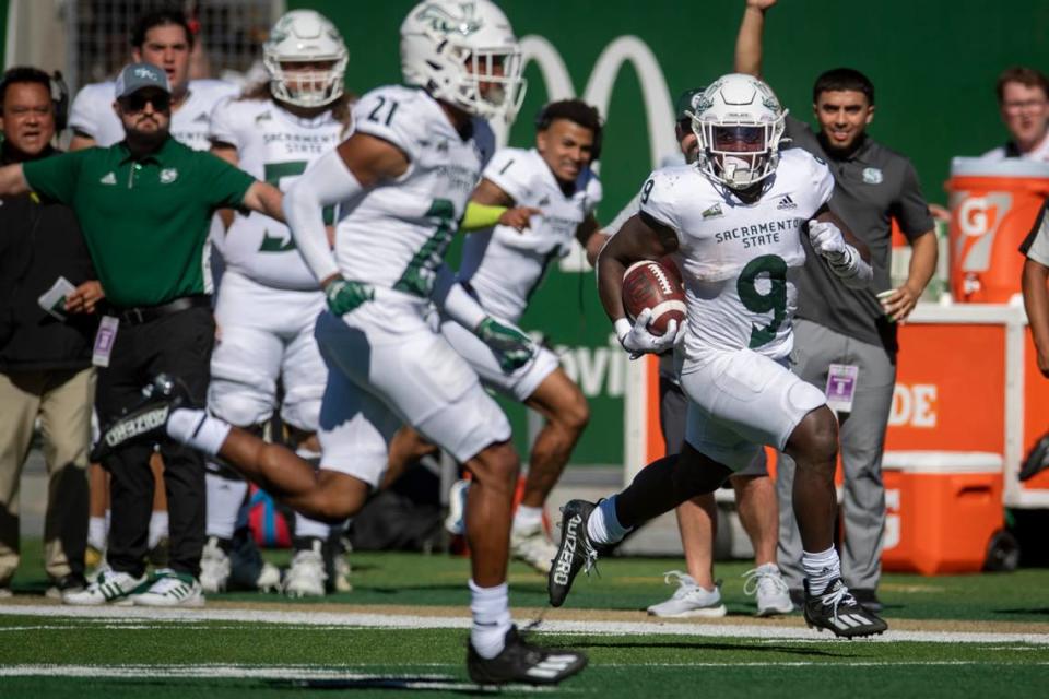 Sacramento State running back Marcus Fulcher runs the ball into the end zone for a touchdown against Colorado State during an NCAA college football game at Canvas Field in Fort Collins, Colo., on Saturday.