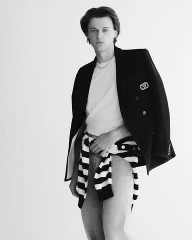 <p>Colette Aboussouan</p> Valentino blazer, sweater, and jeans, YONY T-shirt, John Hardy necklace.