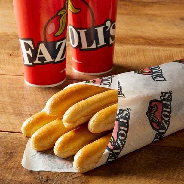Fazoli's is bringing its unlimited breadstick and pizza to Phoenix after 14 years. The first of nine location was announced. Fans have mixed reactions