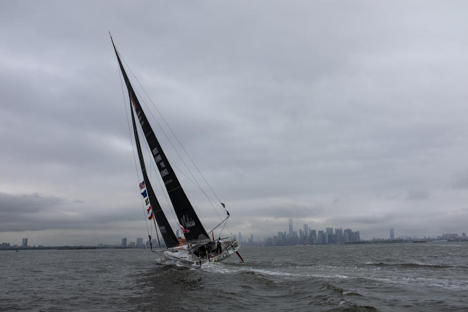 Greta Thunberg, a 16-year-old Swedish climate activist, sails into New York harbor aboard the Malizia II, Wednesday, Aug. 28, 2019. The zero-emissions yacht left Plymouth, England on Aug. 14. She is scheduled to address the United Nations Climate Action Summit on Sept. 23 (AP Photo/Craig Ruttle)