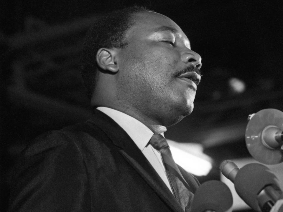 Caught in a somber mood, Dr. Martin Luther King addresses some 2,000 people April 3rd night on the eve of his death. The former founder and chairman of the Southern Christian Leadership Conference was slain by an unknown assailant April 4th.