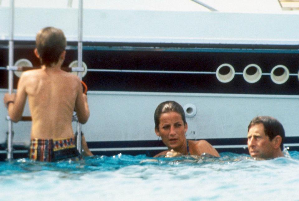 Charles and Diana swimming