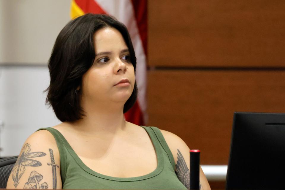 Former Marjory Stoneman Douglas High School student Samantha Fuentes, who was shot and injured in the school shooting, stares down the defendant in the case. Marjory Stoneman Douglas High School shooter Nikolas Cruz is on trial during the penalty phase of his trial at the Broward County Courthouse in Fort Lauderdale on Wednesday, July 19, 2022. Cruz previously plead guilty to all 17 counts of premeditated murder and 17 counts of attempted murder in the 2018 shootings. (Mike Stocker/South Florida Sun Sentinel via AP, Pool)