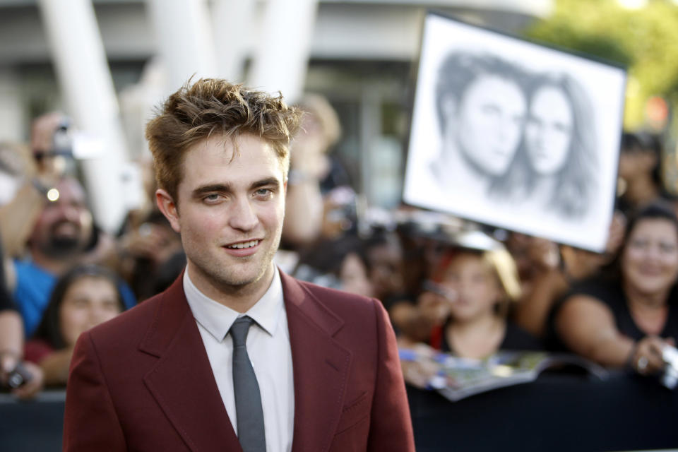 Cast member Robert Pattinson poses at the premiere of "The Twilight Saga: Eclipse" during the Los Angeles Film Festival at Nokia theatre at L.A. Live in Los Angeles June 24, 2010. REUTERS/Mario Anzuoni (UNITED STATES - Tags: ENTERTAINMENT)