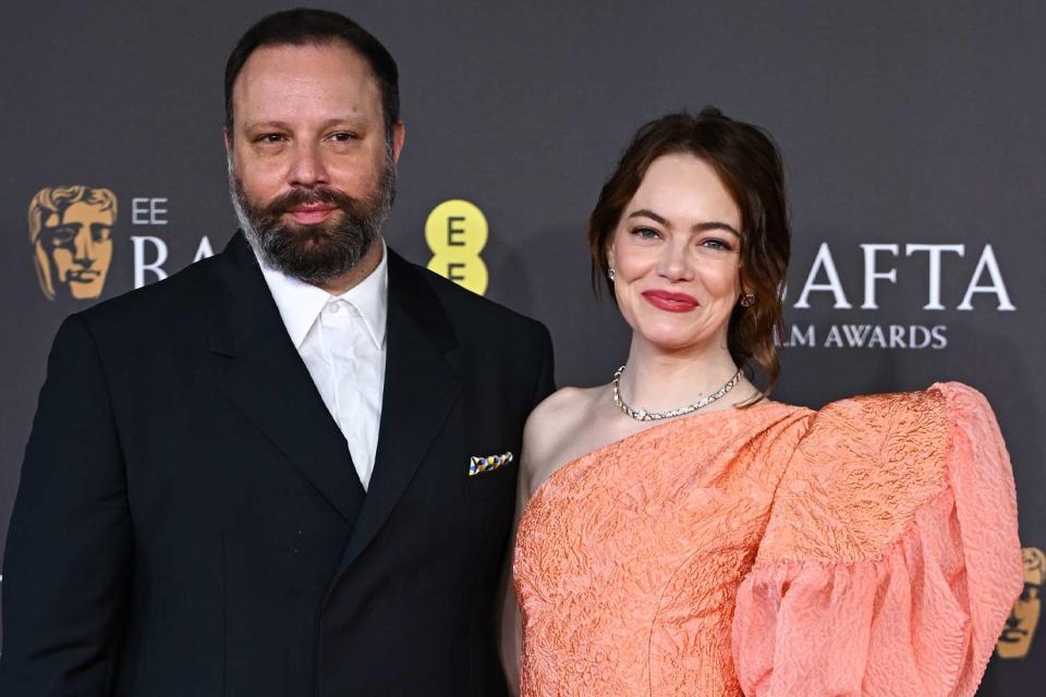 <p>Corbis/Getty</p> Yorgos Lanthimos and Emma Stone on Feb. 18