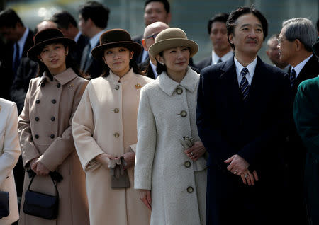 FILE PHOTO : Japan's Prince Akishino (R), his wife Princess Kiko (2nd R) and their daughters Princess Mako (2nd L) and Princess Kako send off Emperor Akihito and Empress Michiko boarding a special flight for their visit to Vietnam and Thailand, at Haneda Airport in Tokyo, Japan February 28, 2017. REUTERS/Issei Kato/File Photo