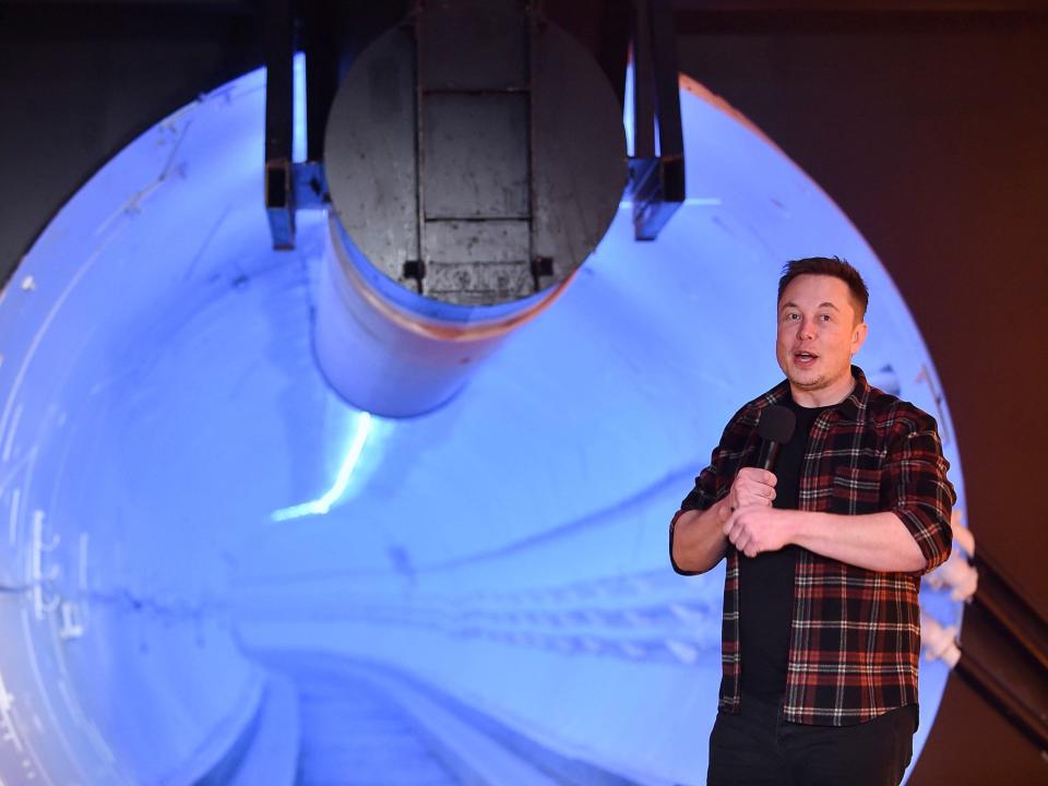 Elon Musk stands by a test tunnel dug by The Boring Company in Hawthorne, California (Getty Images)