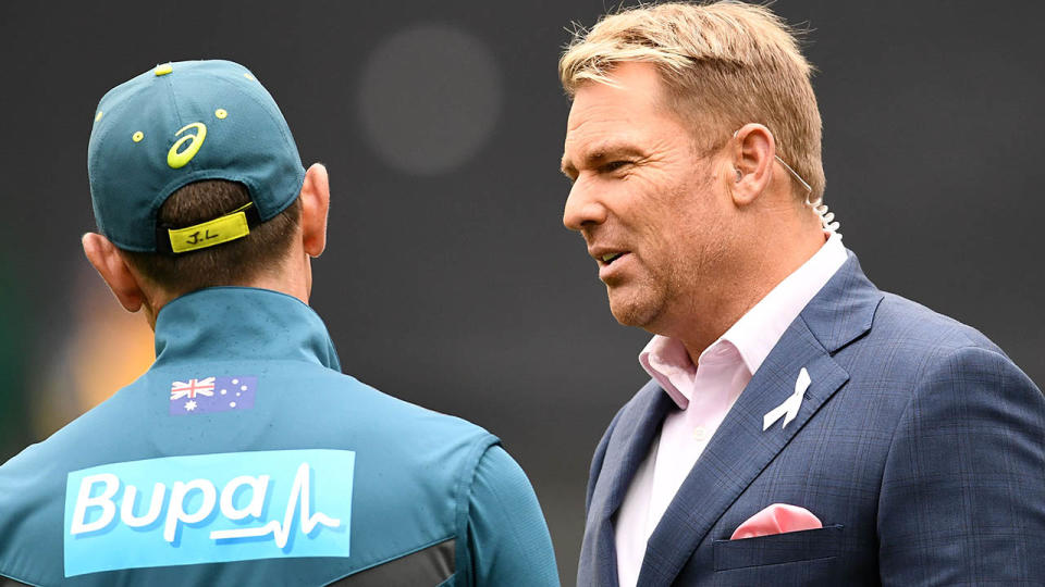 Justin Langer speaks to Shane Warne. (Photo by Quinn Rooney/Getty Images)