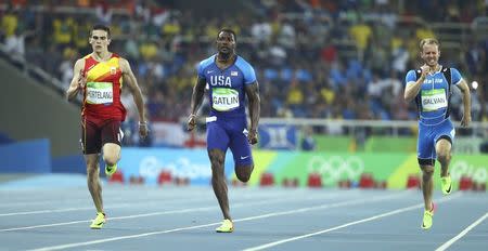 2016 Rio Olympics - Athletics - Semifinal - Men's 200m Semifinals - Olympic Stadium - Rio de Janeiro, Brazil - 17/08/2016. (From L) Bruno Hortelano (ESP) of Spain, Justin Gatlin (USA) of USA and Matteo Galvan (ITA) of Italy compete. REUTERS/Lucy Nicholson