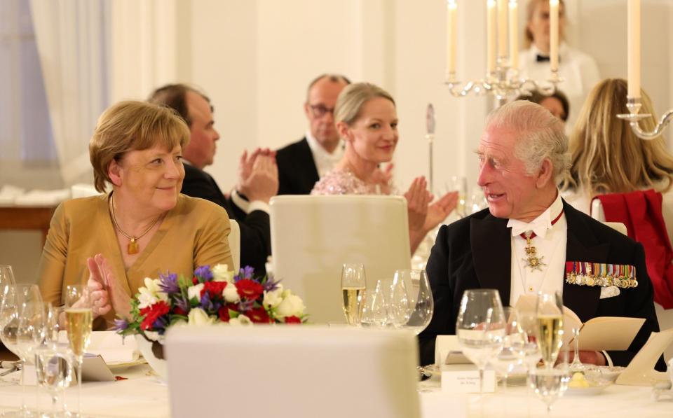 The 120-strong guest list did include Angela Merkel, Mr Scholz’s predecessor - Andreas Rentz