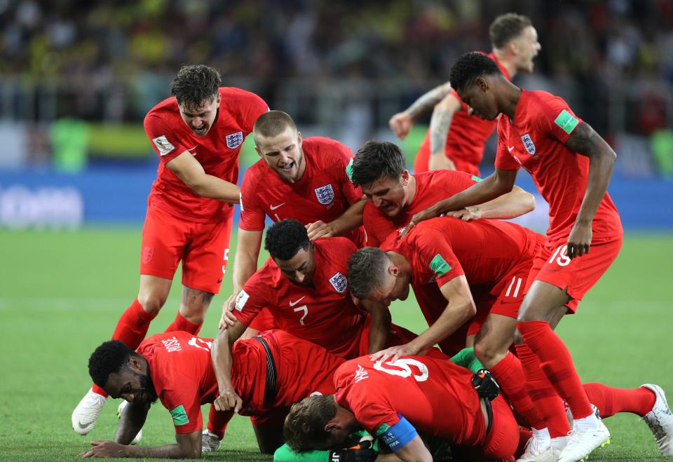 England celebrates after its round of 16 win over Colombia.